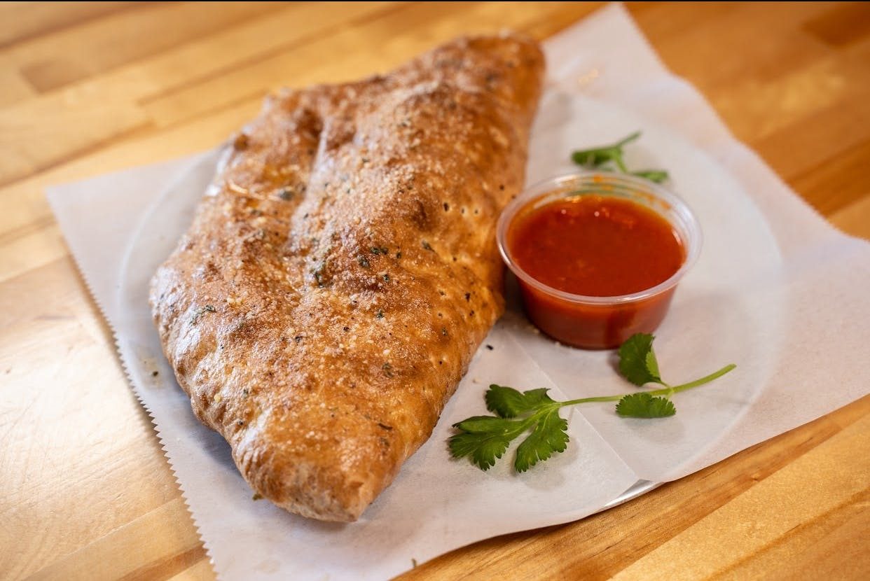 Cheese & Sauce Calzone.