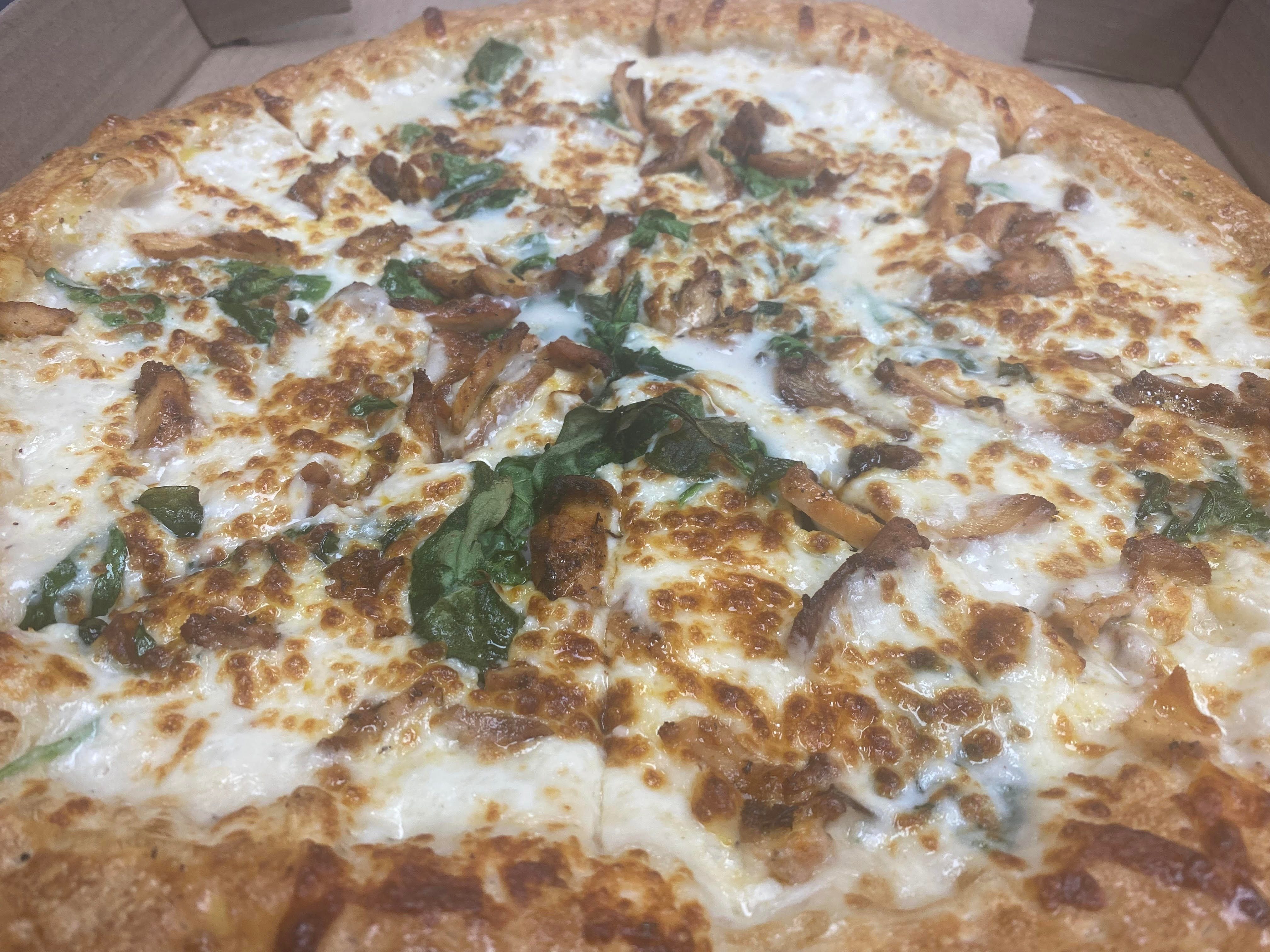 Chicken Alfredo Pizza.